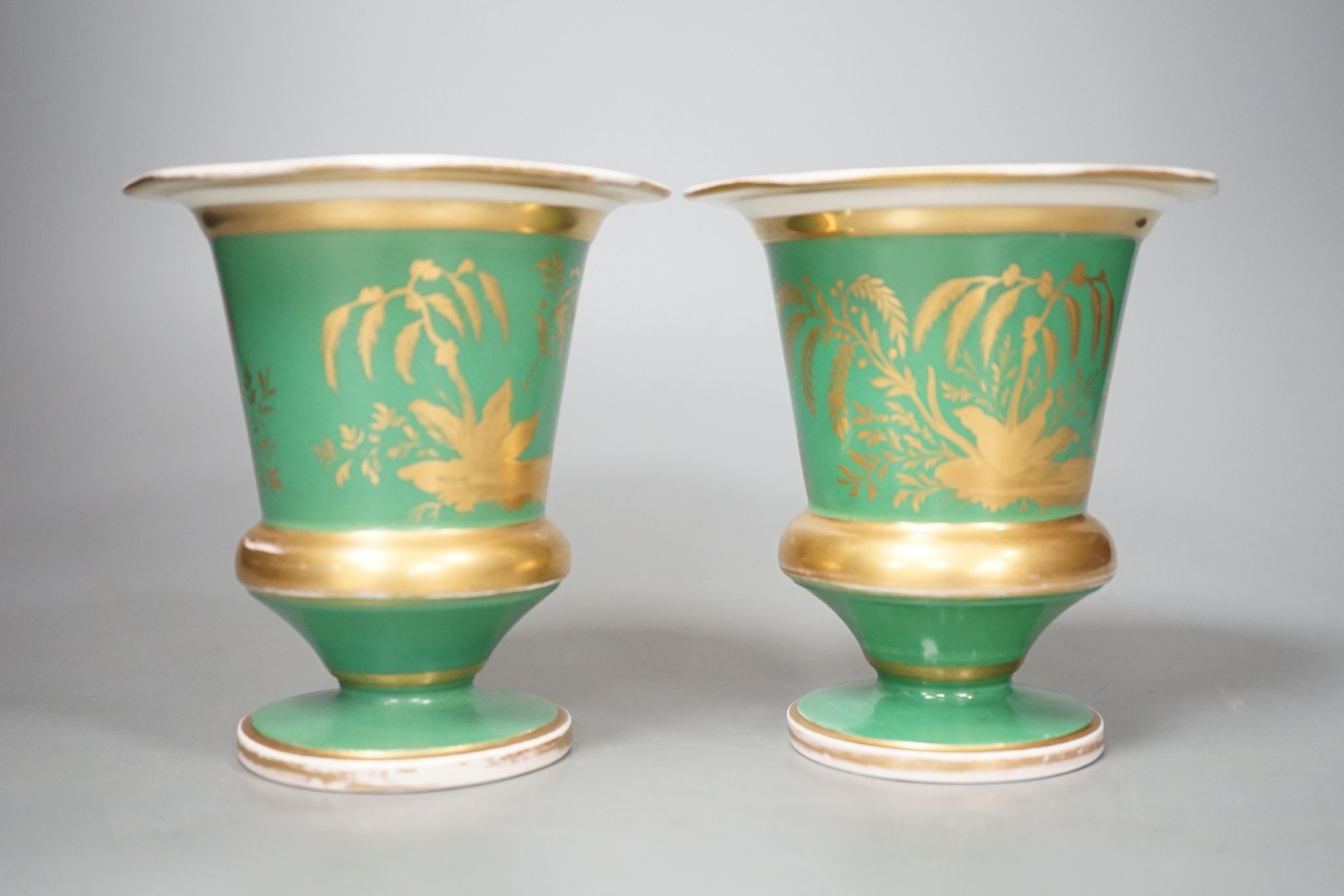 A pair of Continental porcelain spill vases 13cm